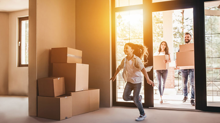 young family moving into new home